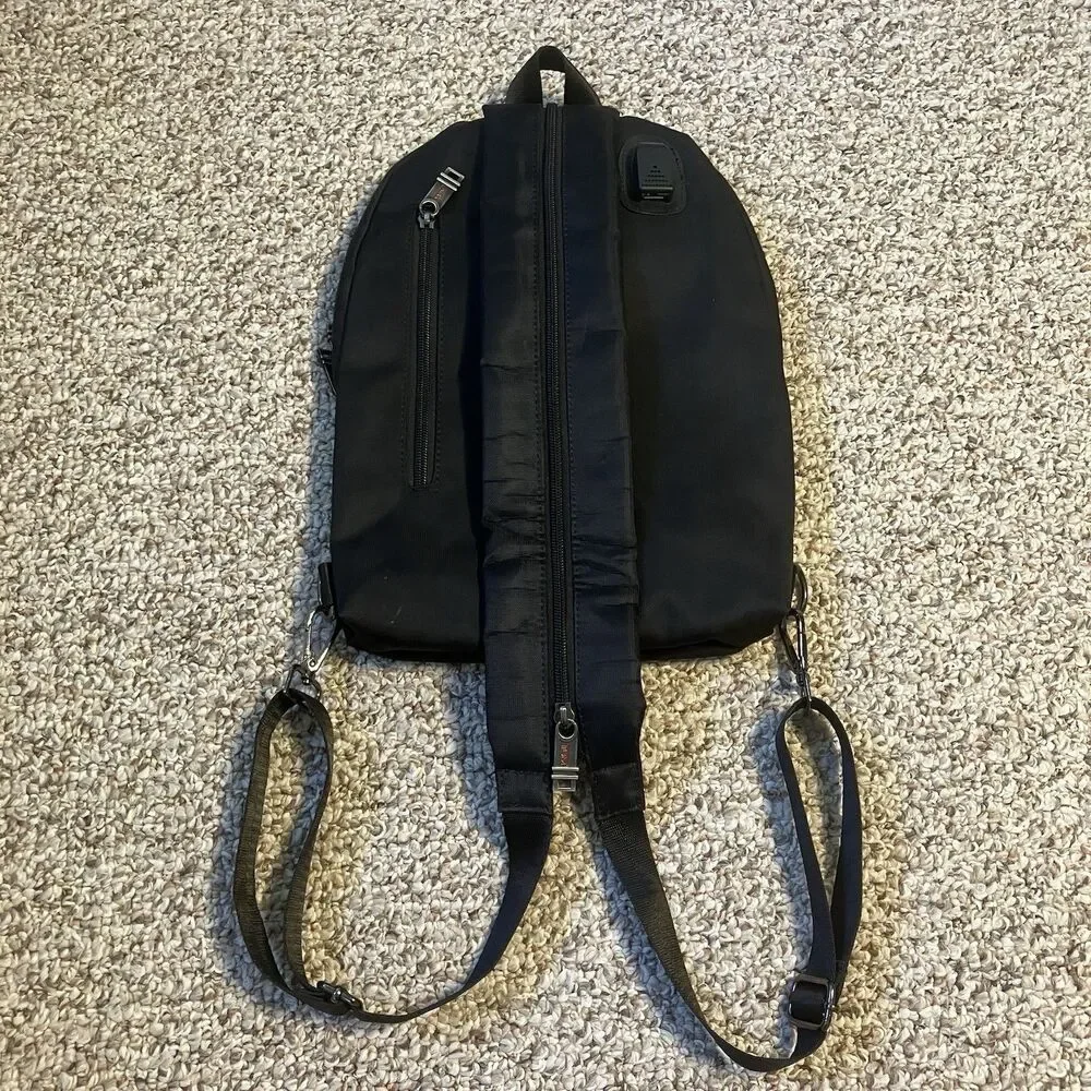 Tumi Black Small Travel Backpack Convertible to Sling Bag Zipper Pockets Charger